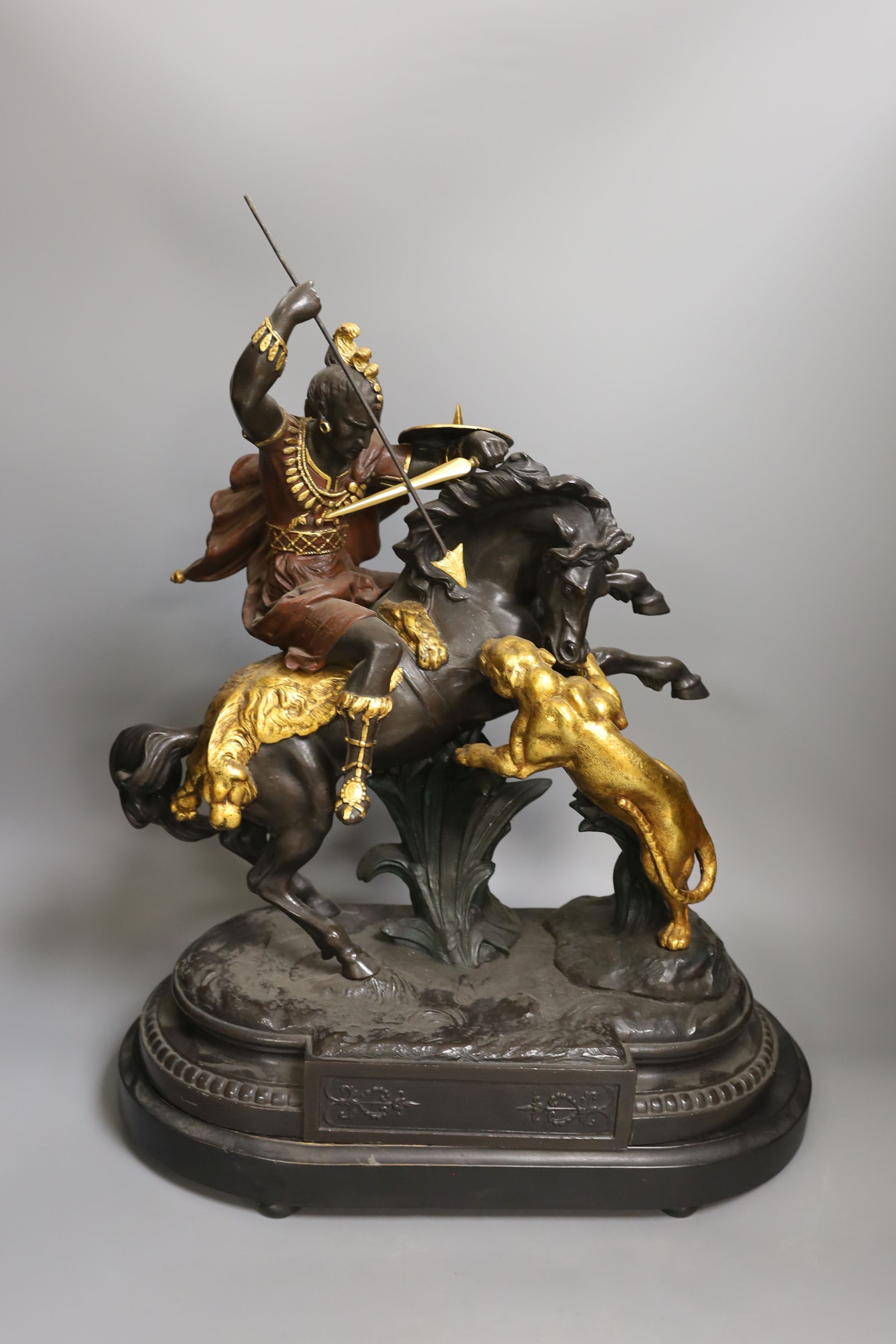 A pair of spelter warriors on horseback in action on mounted base, tallest 51cm